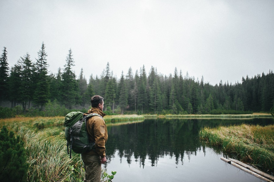 Man standing at river